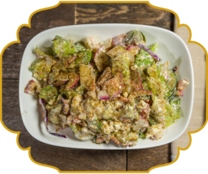 Lebanese salad with romaine, cucumber, radish, sumac, house-made dressing, and crumbled feta cheese at That Lebanese Place