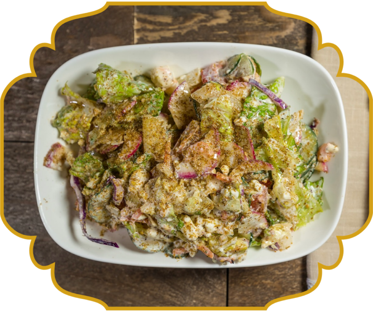 Lebanese salad with romaine, cucumber, radish, sumac, house-made dressing, and crumbled feta cheese at That Lebanese Place