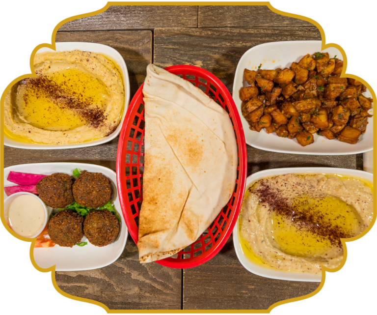 TLP sampler with hummus, baba ghanoush, falafel with tahini, batata harra, and fresh pita at That Lebanese Place