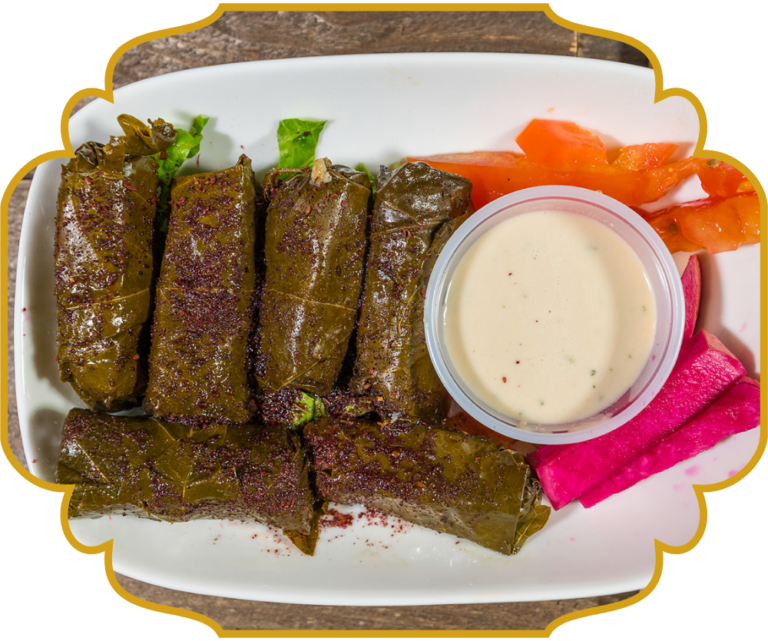 Warak enab, Lebanese stuffed grape leaves with sumac seasoning and tahini sauce at That Lebanese Place